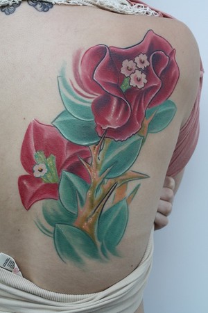 Ty McEwen - flower tattoo